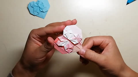 用100元人民币折爱心 爱心折纸