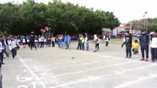 实心球丢18米，来自廉江五中高三级的林同学。