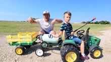 儿童趣味生活，迪玛和爸爸在农场骑拖拉机与喷雾