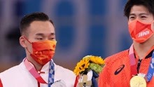 男子体操全能决赛中国选手肖若腾收获银牌，领奖台上他看向金牌的眼神让人心疼。